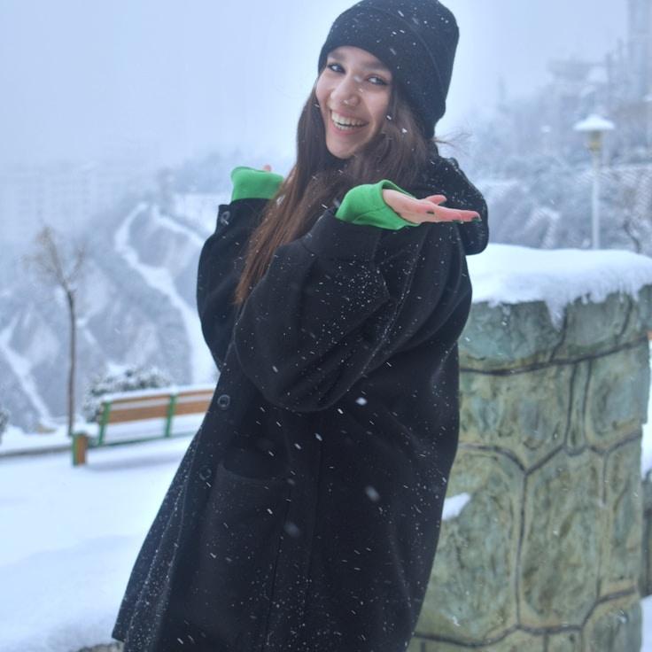 Portrait of Nova Caelum, group coordinator and fusion cooking expert